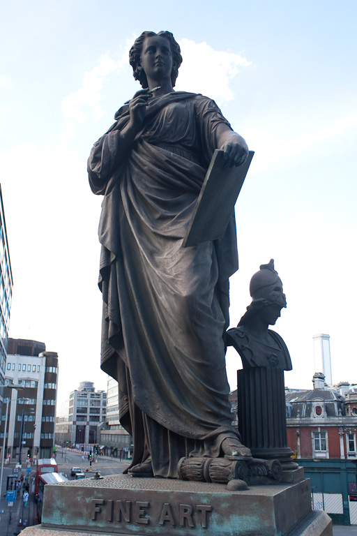 A statue of Fine Art personified