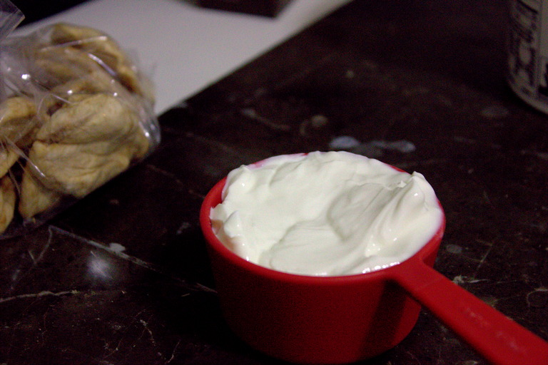 Greek yogurt warming in a cup