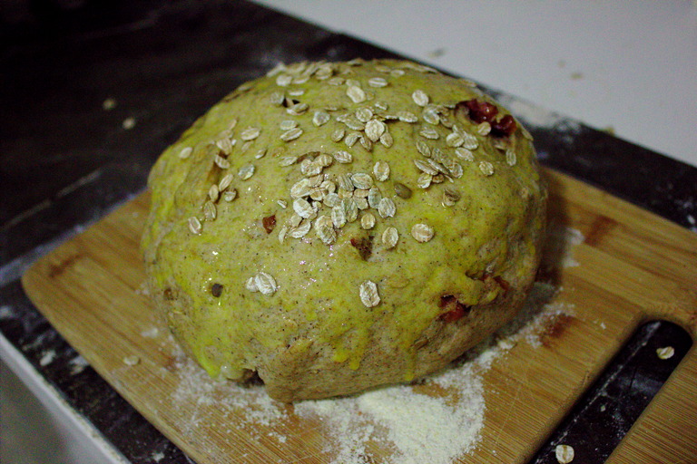 The dough, painted and topped with flakes, ready to bake